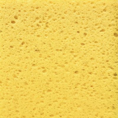 Cleaning sponge with irregular holes